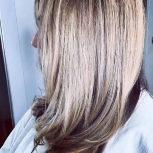 Side view of glossy blonde hair