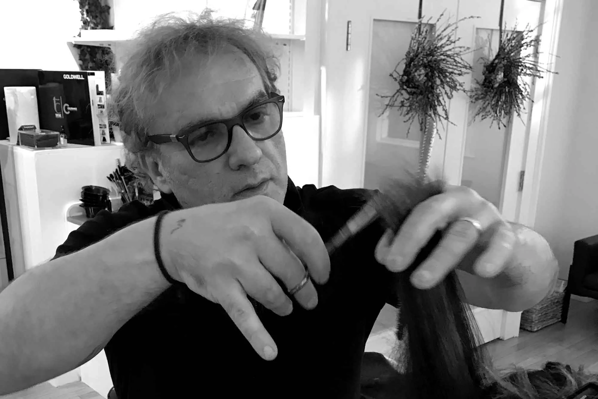 Hairdresser working with scissors